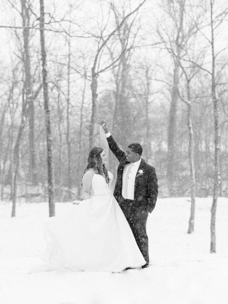 black and white wedding photos in the snow