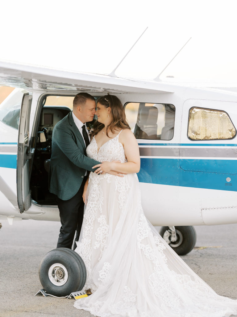 wedding photos in a plane; drake field in arkansas
