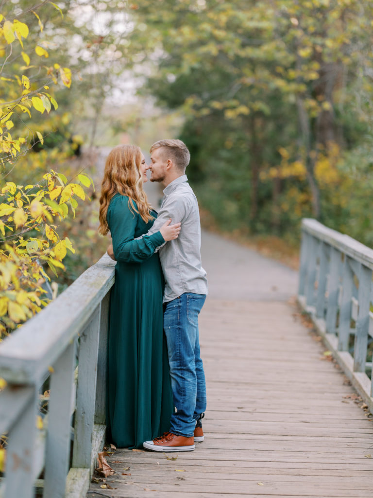 Classic style for engagement session; flowy dress, jeans and sneakers; soon to be bride and groom 